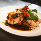 BALLOTINE DE POULET AUX TOMATES CONFITES, MANCHEGO & BASILC, JUS THYM MIEL, POELEE DE LEGUMES
